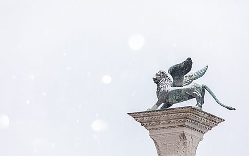 Lion of St Mark covered by snow, Venice, Veneto, Italy, Europe