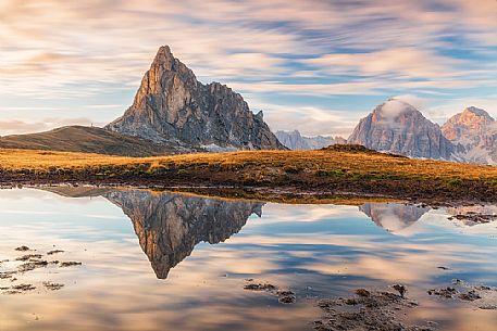 Giau Pass before sunset, Gusela and Tofana mounts reflected on pond, dolomites, Cortina d'Ampezzo, Veneto, Italy, Europe