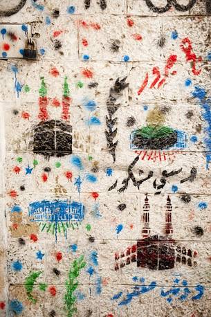 Designs glorifying the pilgrimage to Mecca on the walls of Jerusalem, Israel