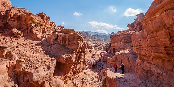 Tourists visit the old village of Petra, Jordan