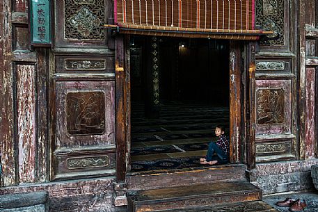 Child in Jewish quarter in Xi'An village, Shanxi, China