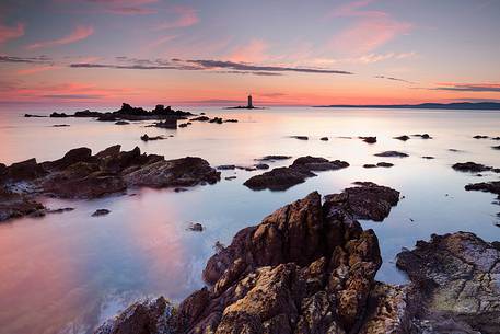 Isle of Sant'antioco. Location Mangiabarche with its typical small and famous lighthouse, Sulcis-Iglesiente, Sardinia, Italy