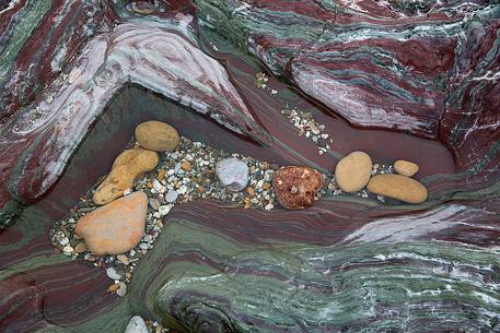 Pan di Zucchero a Masua is one of the most famous seascapes for the presence of a massive cliff just off the coast,
The colors of the rocks complete a magical framework full of mystical atmosphere, Masua, Sulcis-Iglesiente, Sardinia, Italy