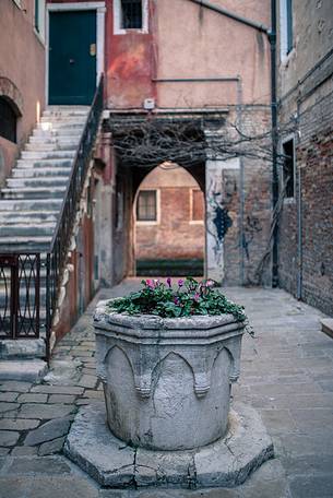 Small square with old well in Venice, Veneto, Italy, Europe