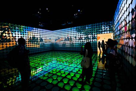 Milan Universal Exposition 2015, Expo Milano 2015, Spain pavilion designed by b720 Fermn Vzquez.  The interior of the pavilion of Spain depicted with lights led the dishes to eat the food