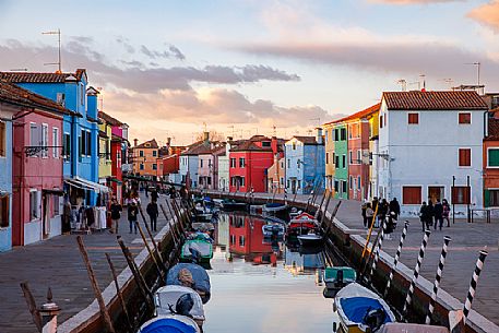 Colorful houses in Burano with canal and moored boast, Venice, Venetian lagoon, Veneto, Italy, Europe