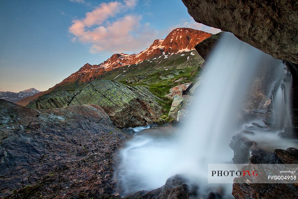 Amazing hidden waterfall in Stelvio National Park.
