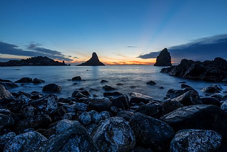 Lachea island and Faraglioni of Aci Trezza at dawn, Ciclopi archipelago, Sicily, Italy, Europe