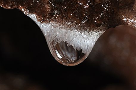 Drop of water in the mine in Molinello Graveglia, inside you see the small scale crystals, Graveglia valley, Genova, Liguria, Italy