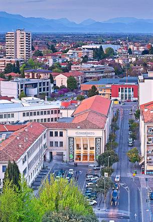 Aerial view of Piazza Maestri del Lavoro square in Pordenone city, in the background the Prealps of Friuli, Friuli Venezia Giulia Italy, Europe