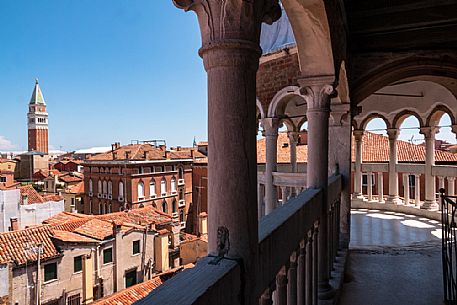 The bell tower and the Cathedral of San Marco in Venice seen from the spiral staircase of Palazzo Contarini del Bovolo, a late Gothic building located in the San Marco district. Italy