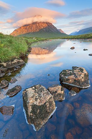 The first light in the morning hit the peak of the great shepard, Buachaille