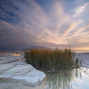 Garda lake form Sirmione village, in the background the silhouettes of Mount Baldo and Mount Pastello, Brescia, Lombardy, Italy, Europe