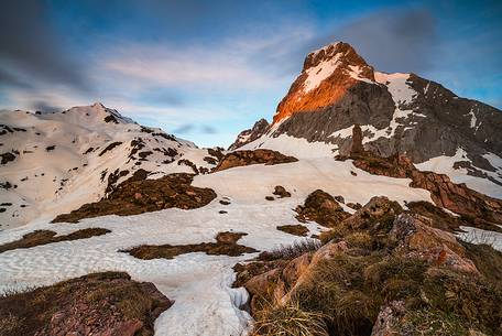 Mt. Coglians illuminated on sunset.