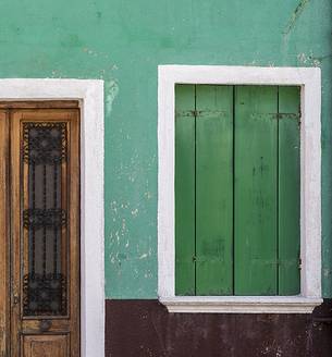 urban colorfull architecture or Burano near Venice, new and old house create a magic atmosphere