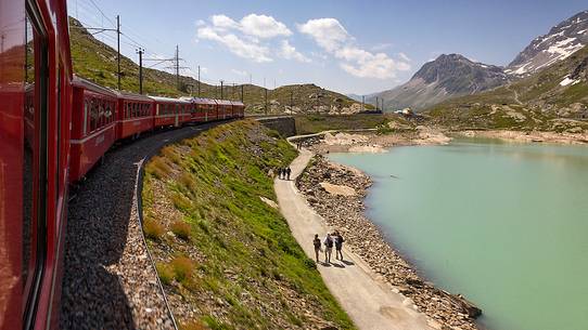 Tourists at the lago Bianco Lake, view from Benina express, UNESCO World Heritage, Bernina pass, Engadin, Canton of Grisons, Switzerland, Europe