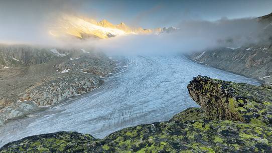 Rhone glacier in the mist of a clear morning dawn, Furka pass, Valais, Switzerland, Europe