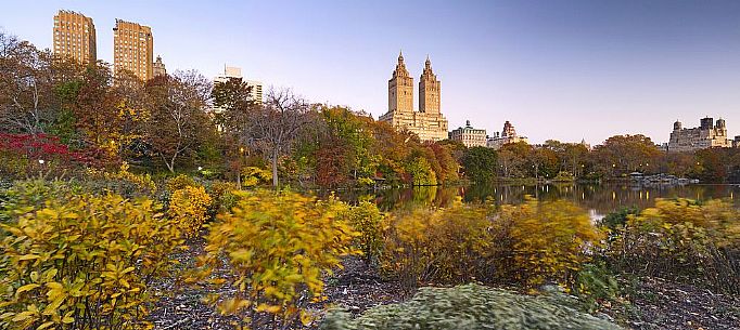 Central Park in autumn with the San Remo apartment building in the background