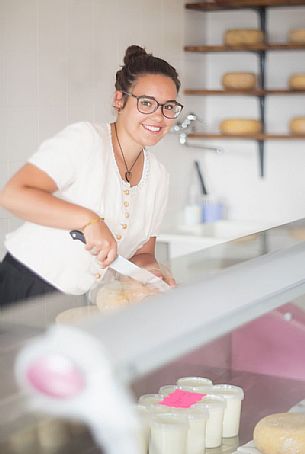 Sale of cheese in Rinfreddo hut, Comelico, dolomites, Italy