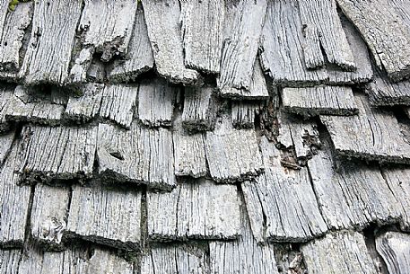 Traditional house, detail of a shingle roof, Badia Valley, dolomites, Italy