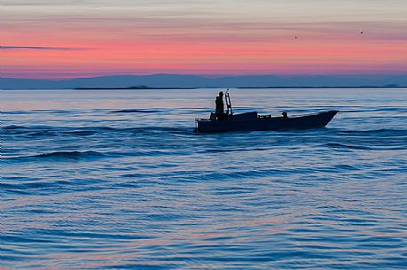 Fishing boat in the Marano's lagoon, Marano Lagunare, Italy