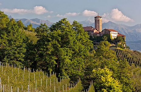 Castel Valer castle and apple trees, Val di Non, Trentino, Italy