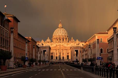 Rome: Street of the Conciliation with St. Peter's Basilica illuminated by the first light of the dawn