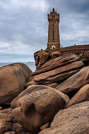 Pink Granite coast, pointe De Squewel, the Mean Ruz lighthouse built of granite from Ploumanac'h, Ctes-d'Armor province, Brittany, France, Europe