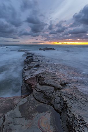 Sea rocks at twilight, Calafuria, Livorno,Tuscany, Italy