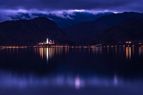 Bled lake with the church of Assumption, Marijino vnebovzetje, on the islet by night, Slovenia, Europe