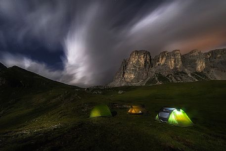 Moonlight campground in front of Croda da Lago mountain, Cadore, dolomites, Italy