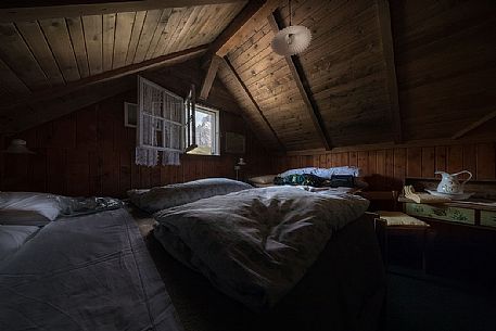 Inside view of a room at Capanna Cervino mountain hut, Rolle Pass, Parco Naturale Paneveggio Pale di San Martino, dolomites, Trentino Alto Adige, Italy, Europe
