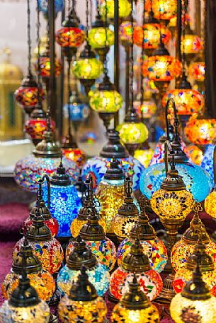 Traditional multicolored eastern glass lamps lighting on Dubai souk, United Arab Emirates, Asia