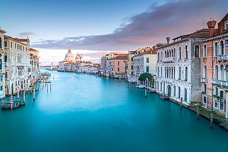 The Grand Canal and in the background the Santa Maria della Salute church from Accademia bridge at twilight, Venice, Italy, Europe